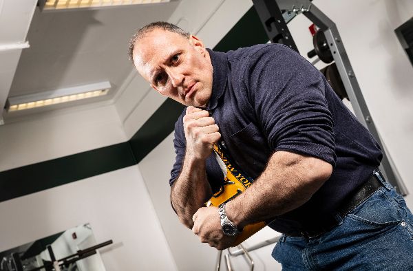 BU Trainer Goes for Steel Spike Bending Guinness World Record