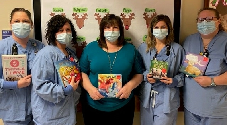 Northern Tier Alpha Zeta Chapter donates books to Guthrie Birthing Center