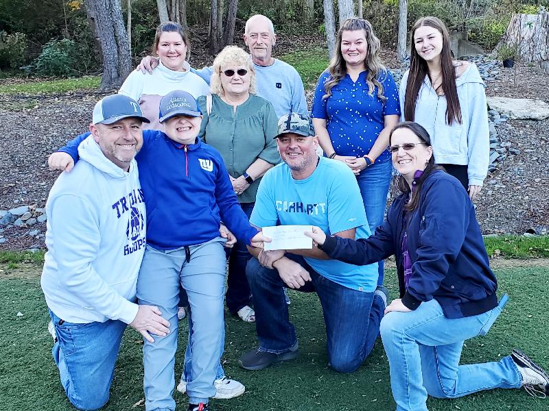 Tanner’s donates $5K from golf tournament to Down Syndrome to Walk for Our Buddies