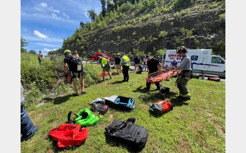 First responders save woman, dog who fell over embankment