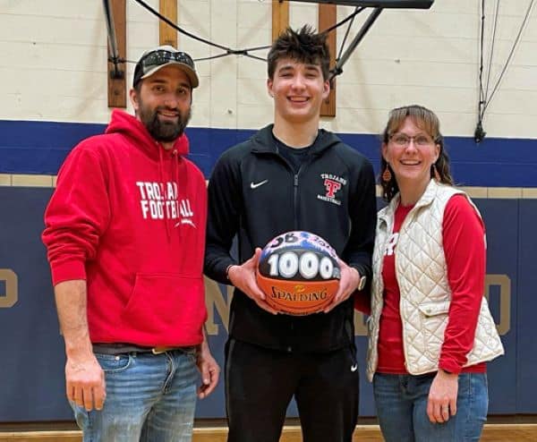 Troy’s Burbage joins 1,000-point club