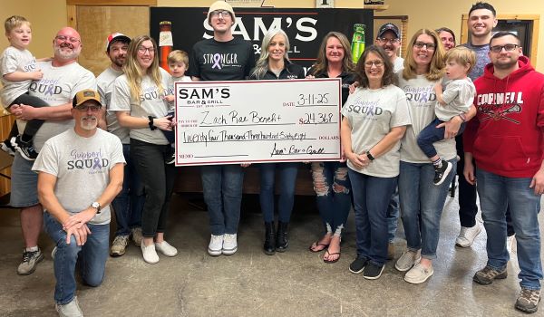 Sam’s Bar and Grill donates over $47,000 to local families