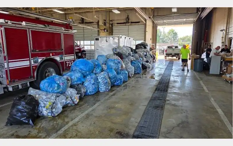 Elmira Heights Fire Department collects bottles and cans at WGI