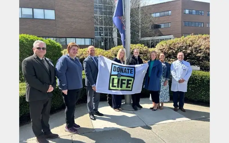 Guthrie, CORE hold flag raising ceremony in honor of National Donate Life month