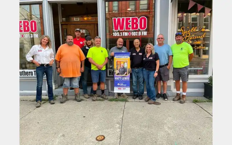 Tioga United Way presents WEBO’s Matt Lewis with Community Pillar banner